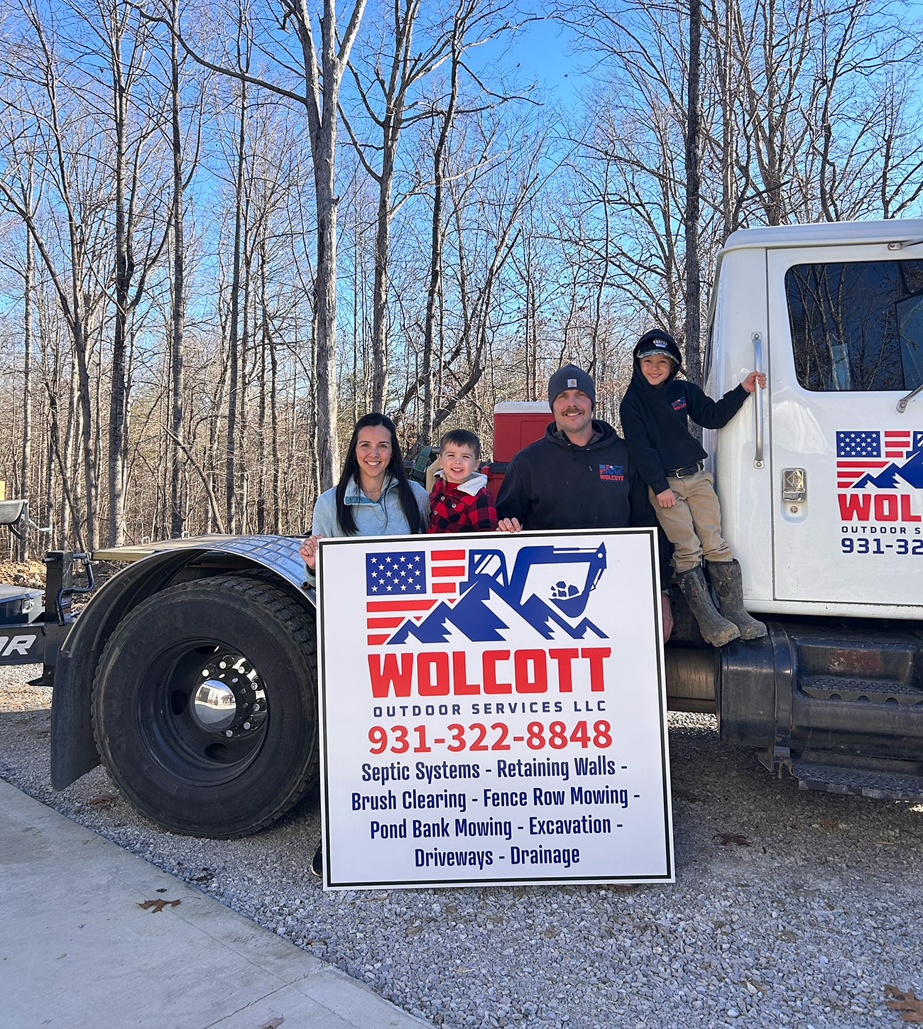 Wolcott owner with his family