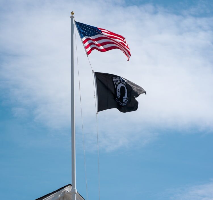 Flag pole with two flags